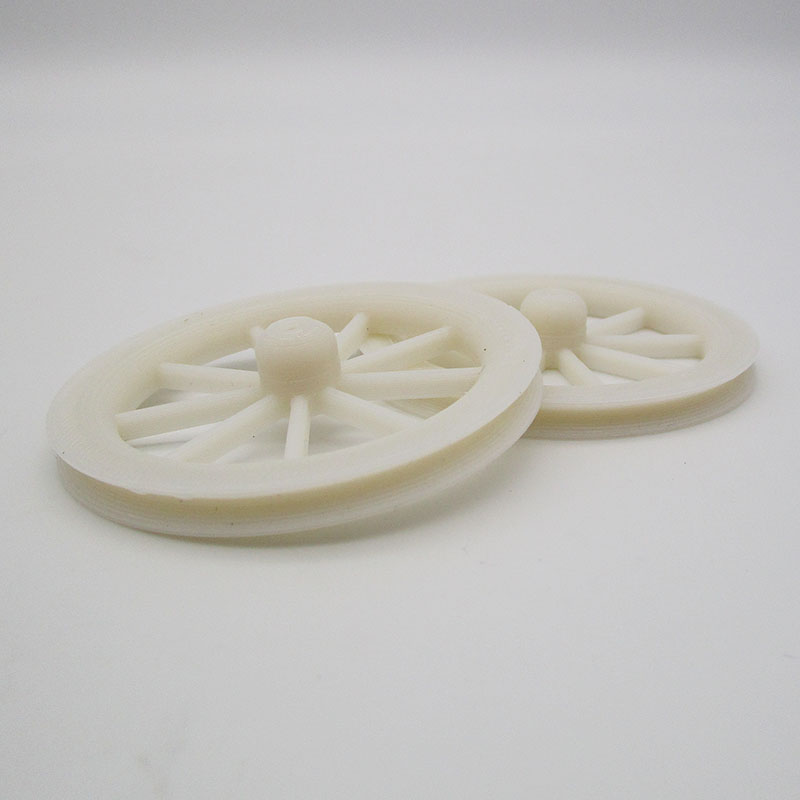 White 3D printed train wheels made with Nanovia HIPS 3D printer filament