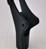 Carbon fibre reinforced polypropylene mechanical pivot by Lynxter 3D printed on the Lynxter S600D multi material 3D printer