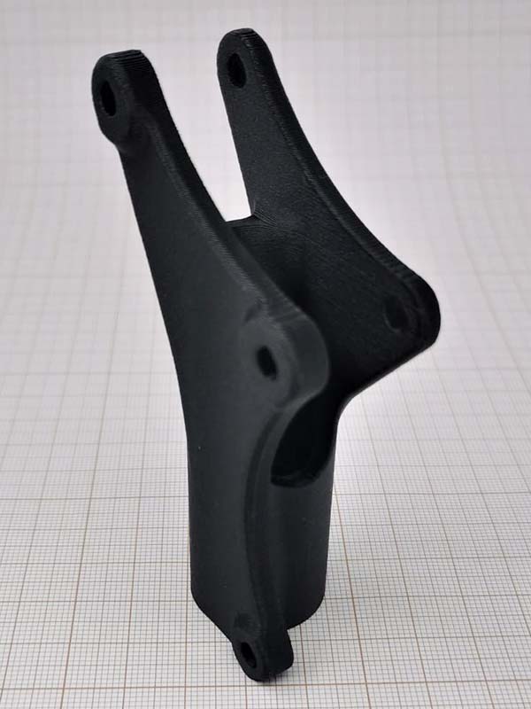 Carbon fibre reinforced polypropylene mechanical pivot by Lynxter 3D printed on the Lynxter S600D multi material 3D printer